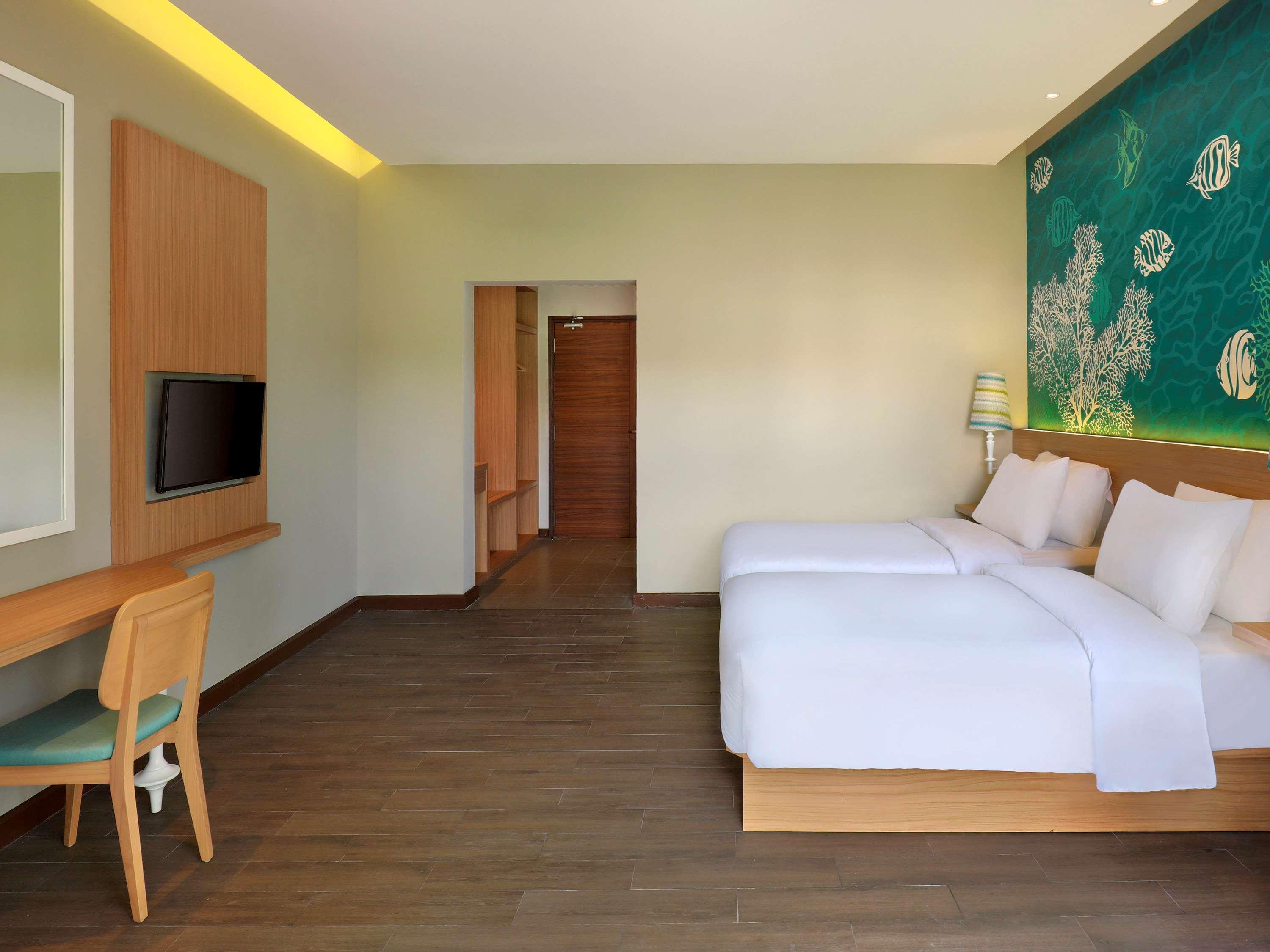 เมอร์เคียว มานาโด ตาเตลี บีช รีสอร์ต Hotel ภายนอก รูปภาพ