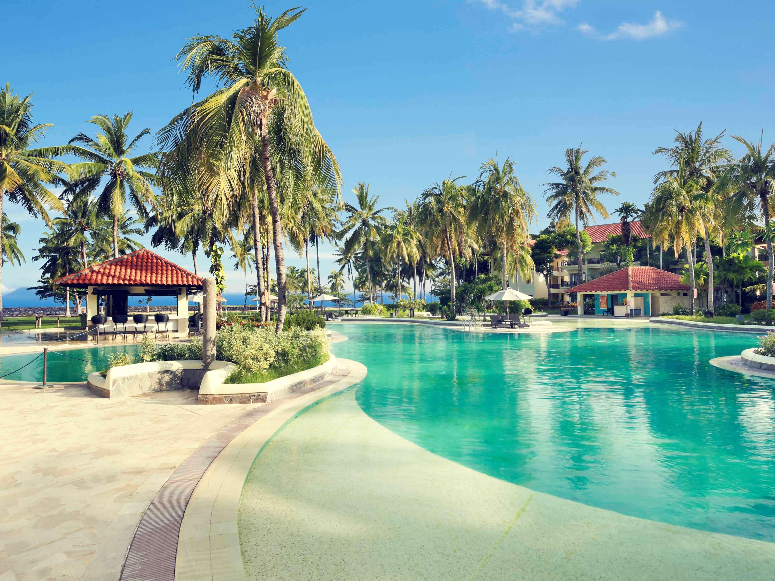 เมอร์เคียว มานาโด ตาเตลี บีช รีสอร์ต Hotel ภายนอก รูปภาพ