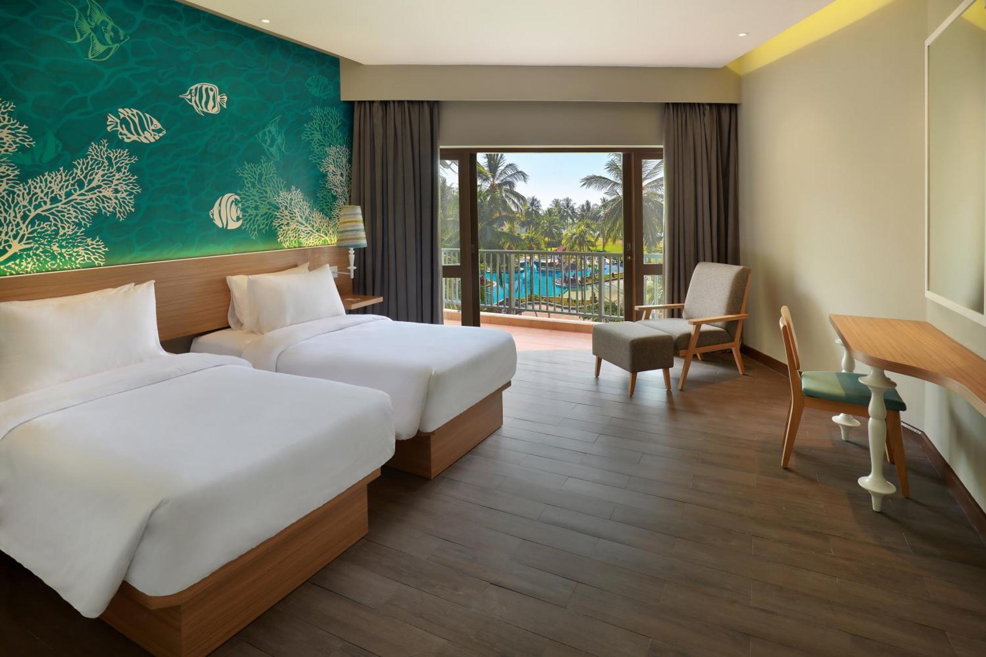 เมอร์เคียว มานาโด ตาเตลี บีช รีสอร์ต Hotel ภายนอก รูปภาพ