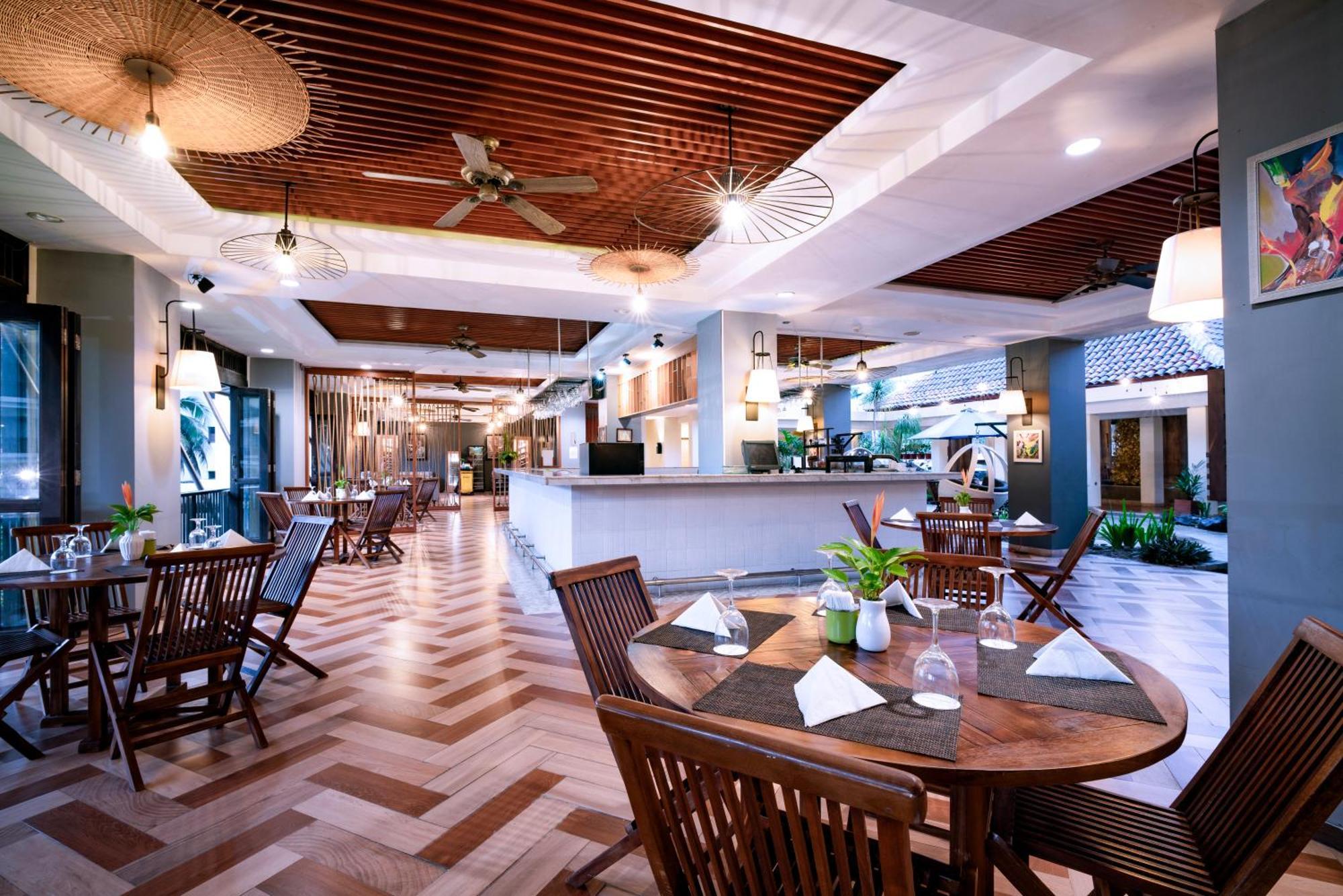 เมอร์เคียว มานาโด ตาเตลี บีช รีสอร์ต Hotel ภายนอก รูปภาพ